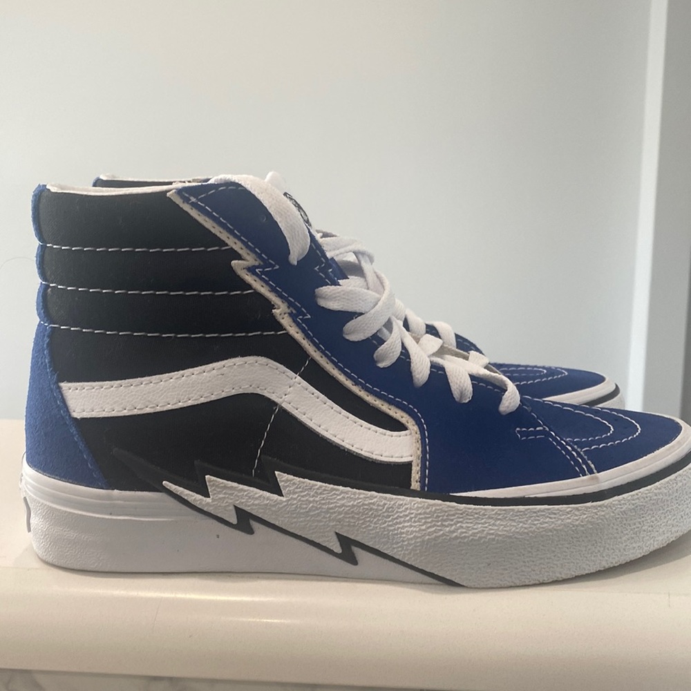 Vans High tops.  Great shape. NEVER WORN!!